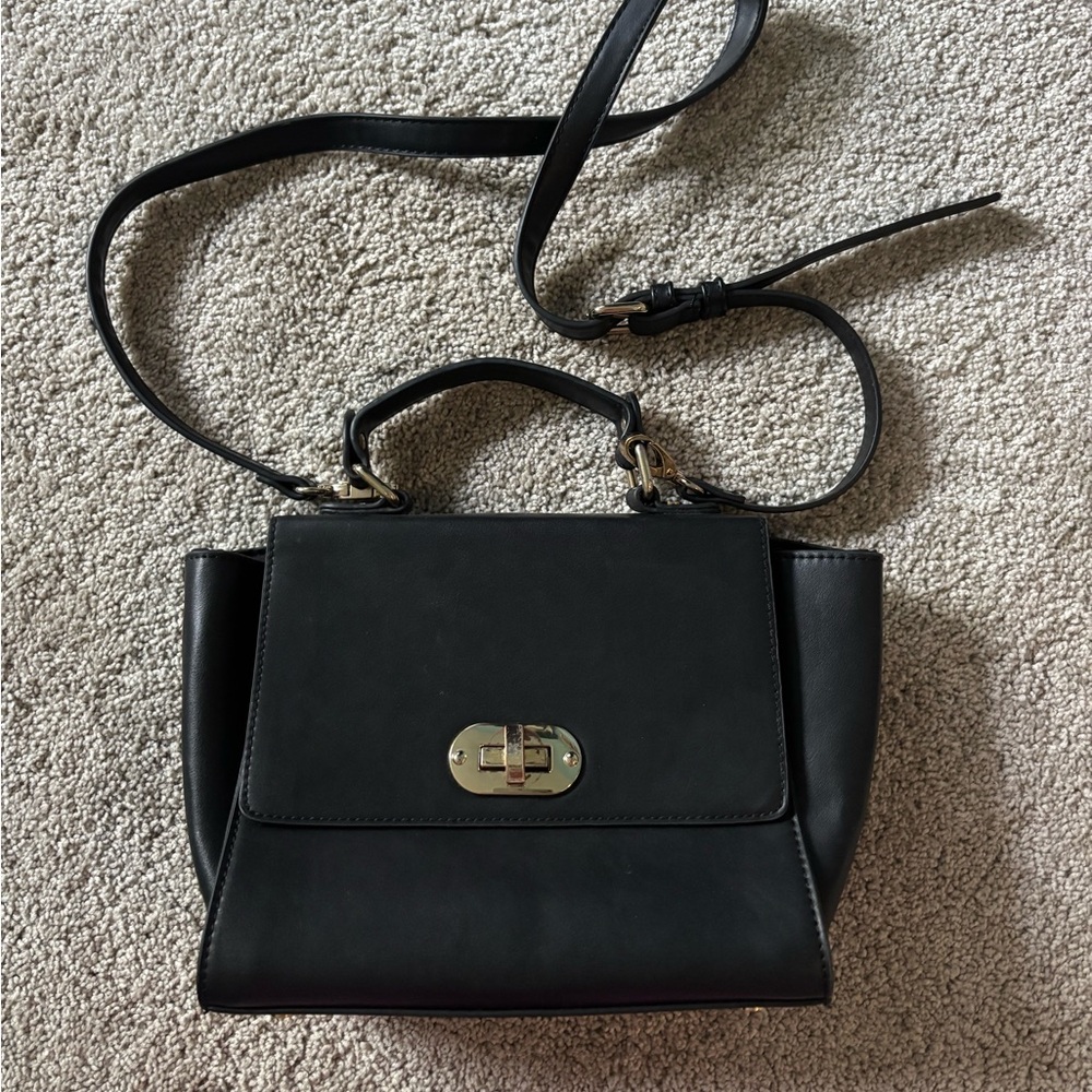 Black purse with gold hardware